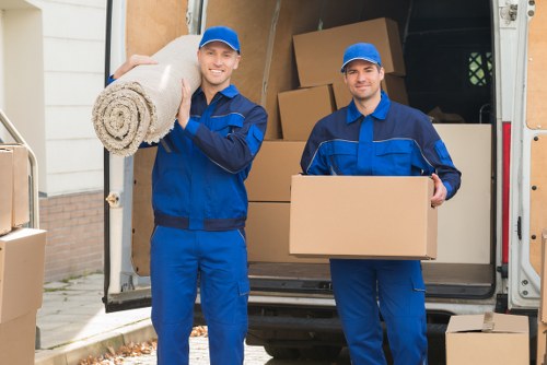 Furniture collection being loaded into a van