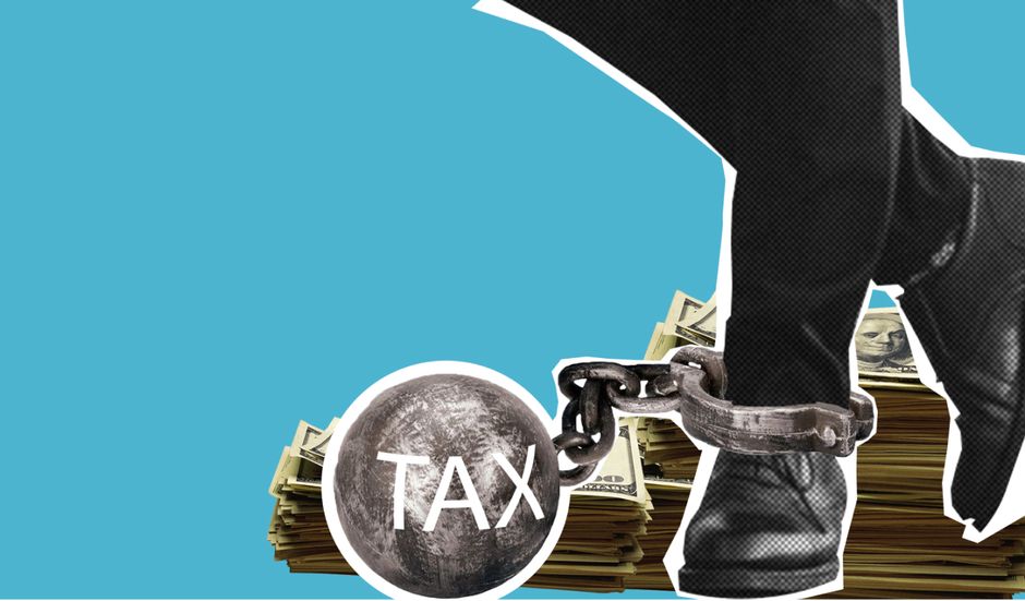 A digital illustration featuring a person's hand chained to a ball labeled 'TAX', with stacks of U.S. dollar bills in the background. The scene is set against a light blue background, symbolising financial constraints or burdens associated with taxation. The hand appears to be emerging from or resting on the pavement, suggesting a sense of restriction or limitation. This visual is related to themes of financial obligations, which align with house removals or relocation services that involve logistics, packing, and transport considerations. The image contextually supports the idea of managing costs or hidden fees during home relocation, and it is associated with Man with Van Shacklewell's services. The composition emphasizes the weight of financial responsibilities during moving or packing processes.